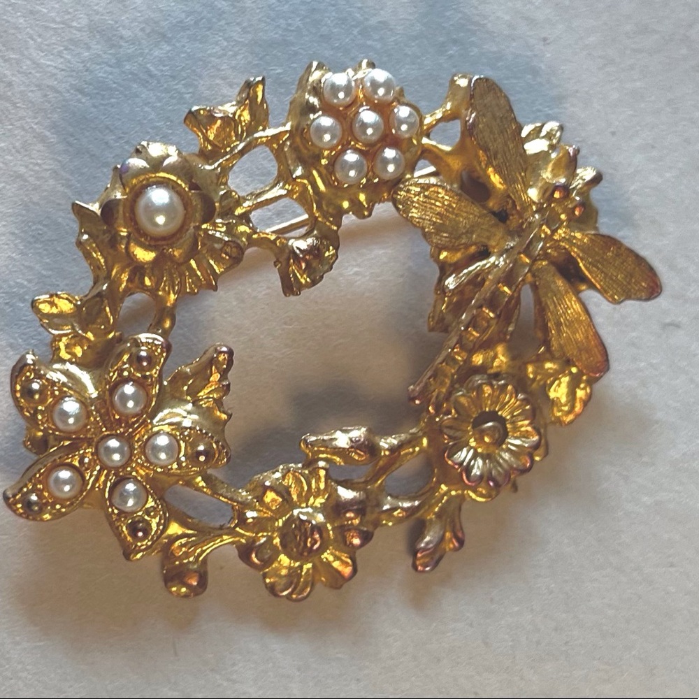 Costume brooch with dragonfly and flowers